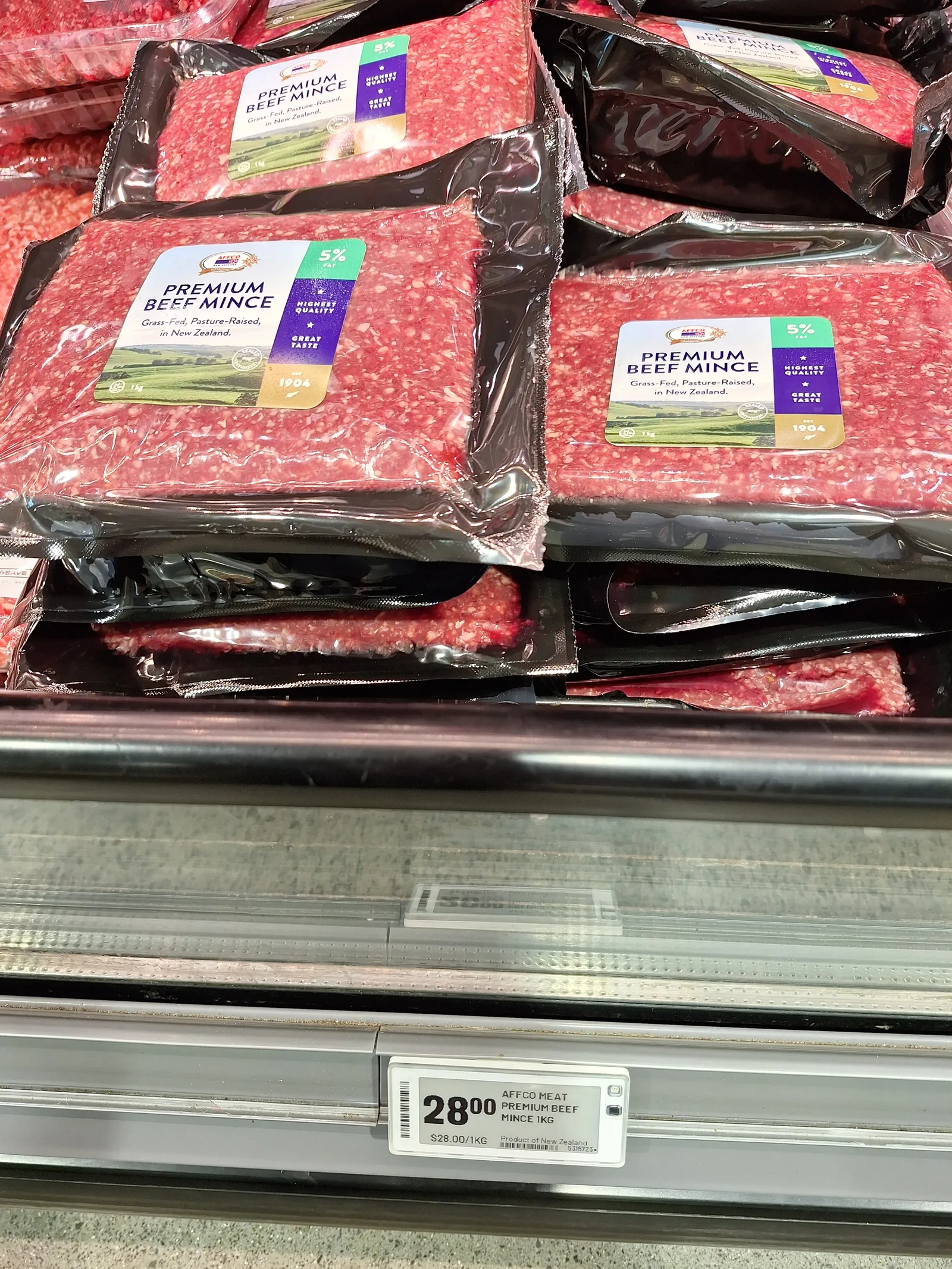 PAK’nSAVE Westgate premium beef mince display with a shelf ticket showing 28 dollars per kilogram