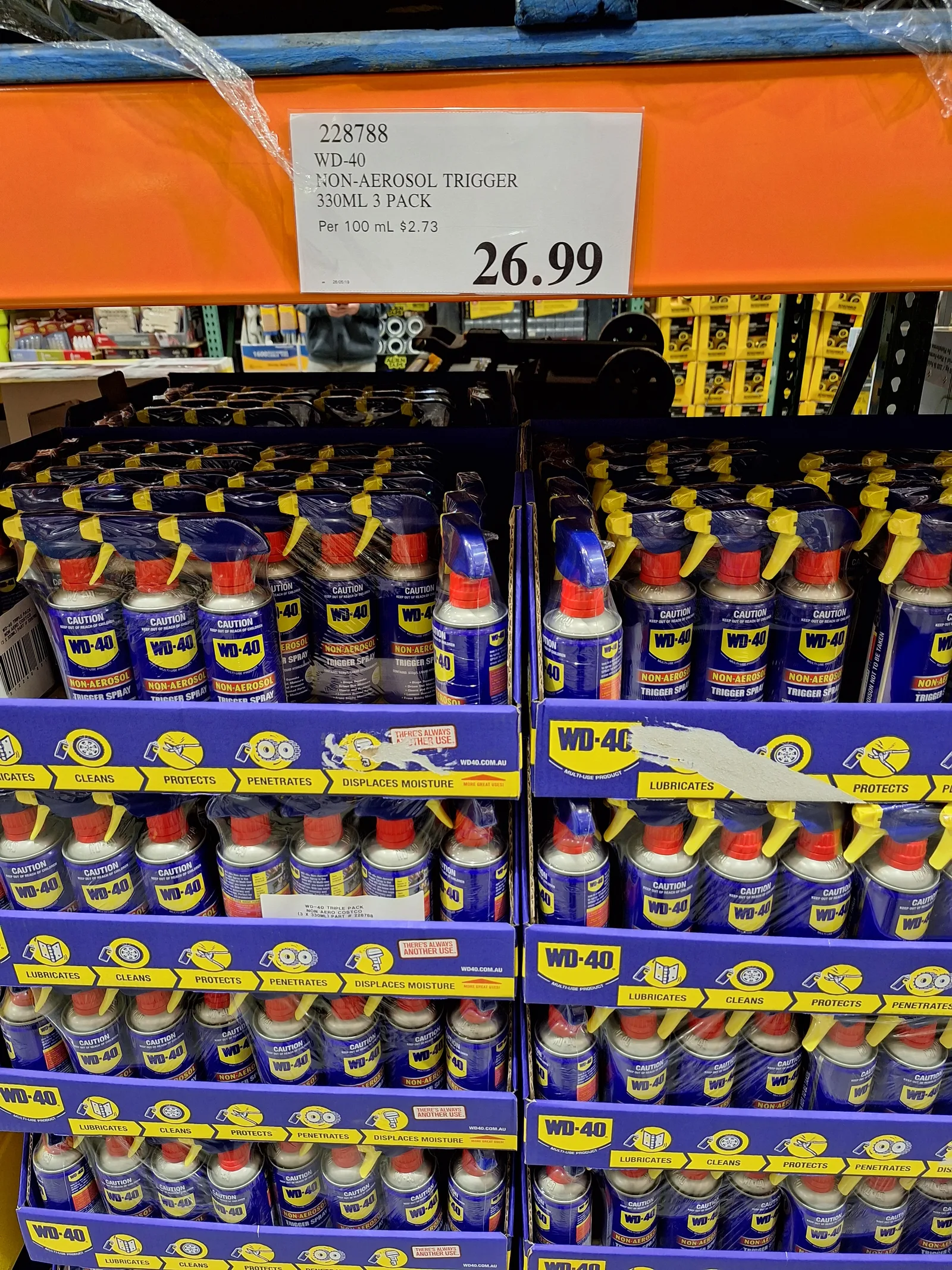 Costco Westgate display of WD-40 Non-Aerosol Trigger Spray 330 mL three-packs with a shelf price of $26.99